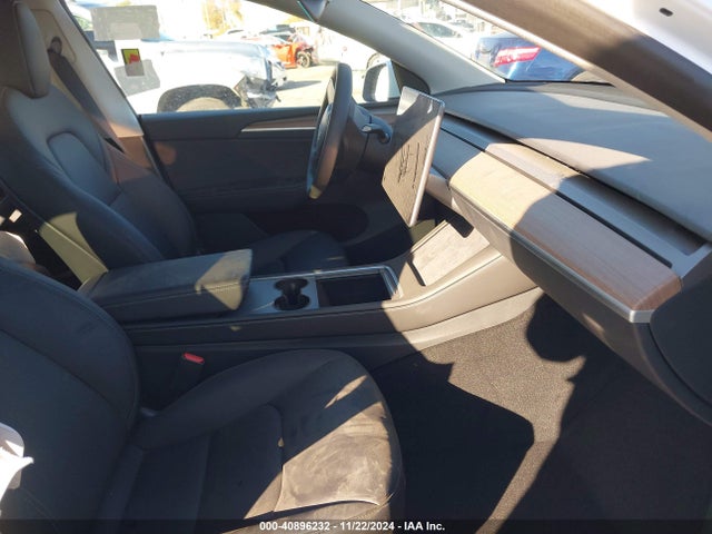 2023 TESLA MODEL Y 7SAYGDEEXPF896297 Photo 4