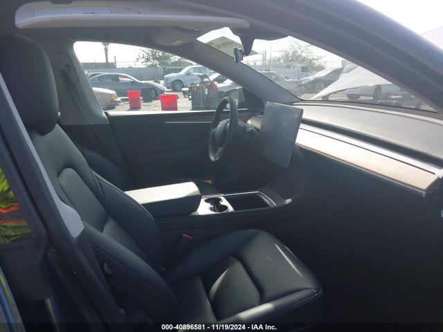2023 TESLA MODEL Y 7SAYGAEE8PF623860 Photo 4