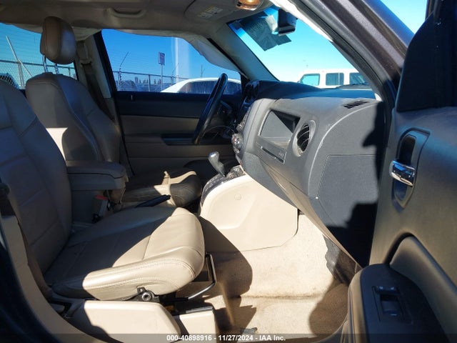 1C4NJPFA2ED890688 Jeep Patriot High Altitude