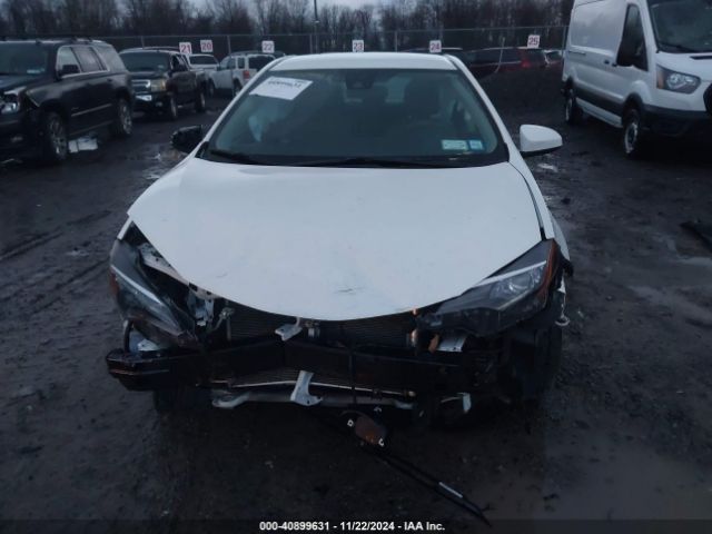 2T1BURHE4JC087300 Toyota COROLLA LE