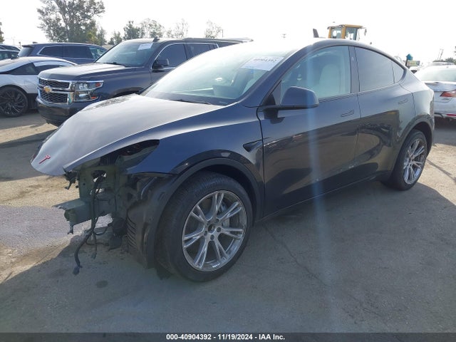 2024 TESLA MODEL Y 7SAYGDED8RF008642 Photo 1