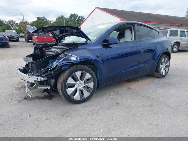 2024 TESLA MODEL Y 7SAYGDEE8RA252538 Photo 1