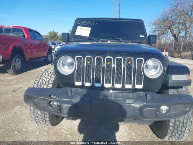 1C4HJXEG9JW216717 Jeep Wrangler Unlimited Sahara 4x4