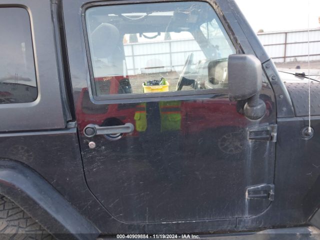 1C4AJWBG5EL247812 Jeep Wrangler Sahara
