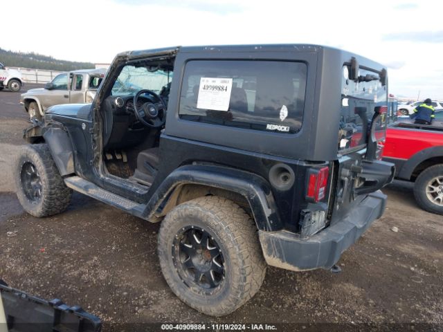 1C4AJWBG5EL247812 Jeep Wrangler Sahara
