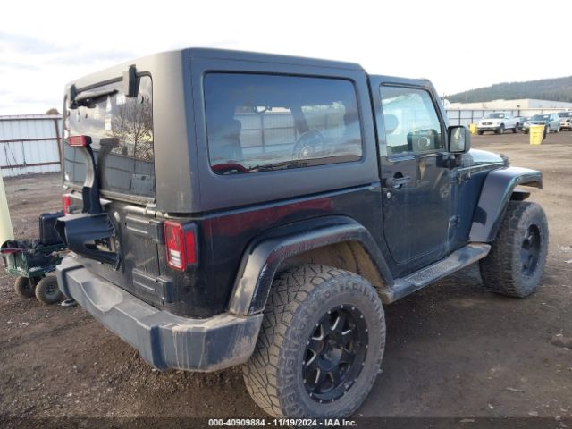 1C4AJWBG5EL247812 Jeep Wrangler Sahara