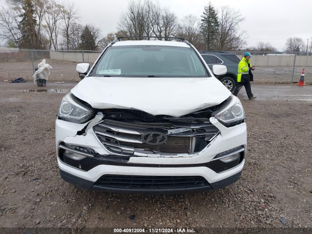 5NMZUDLB0HH017490 Hyundai Santa Fe Sport 2.4l