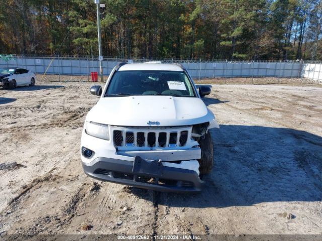 1C4NJCBA4ED743075 Jeep Compass Sport