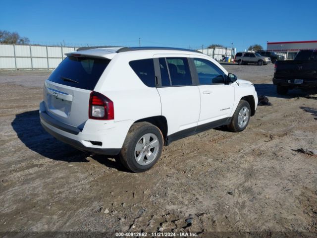 1C4NJCBA4ED743075 Jeep Compass Sport
