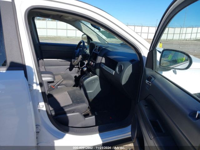 1C4NJCBA4ED743075 Jeep Compass Sport