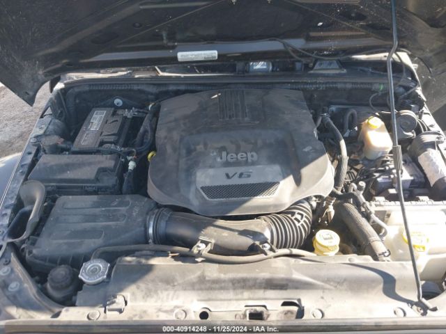 1C4HJWDG9FL568488 Jeep Wrangler Unlimited Freedom Edition