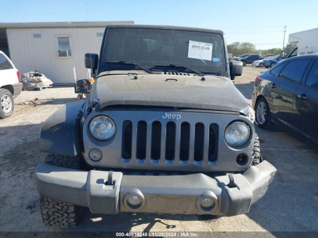 1C4HJWDG9FL568488 Jeep Wrangler Unlimited Freedom Edition