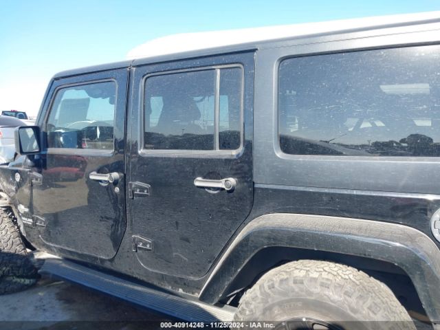 1C4HJWDG9FL568488 Jeep Wrangler Unlimited Freedom Edition