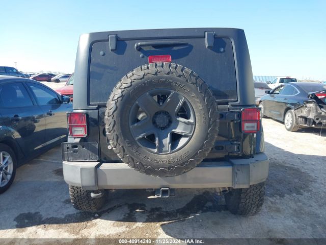 1C4HJWDG9FL568488 Jeep Wrangler Unlimited Freedom Edition