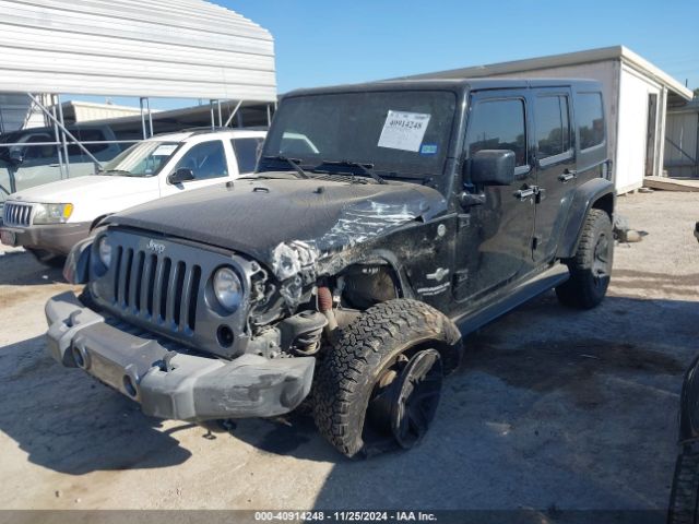 1C4HJWDG9FL568488 Jeep Wrangler Unlimited Freedom Edition