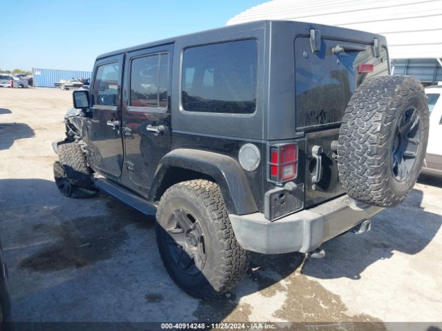 1C4HJWDG9FL568488 Jeep Wrangler Unlimited Freedom Edition