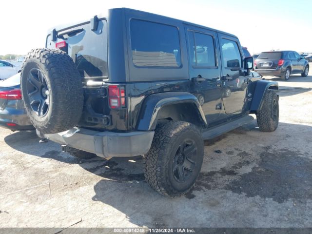 1C4HJWDG9FL568488 Jeep Wrangler Unlimited Freedom Edition