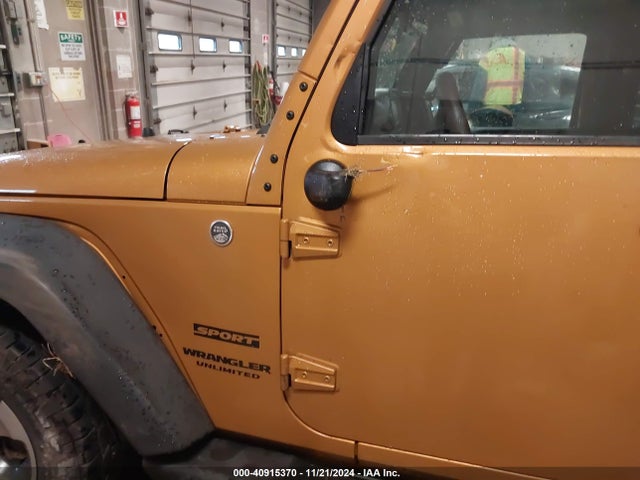 1C4BJWDG1EL250594 Jeep Wrangler Unlimited Sport
