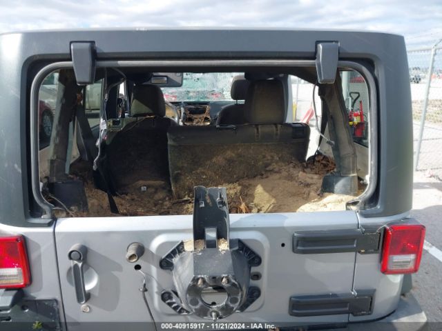 1C4BJWDG0EL320652 Jeep Wrangler Unlimited Sport