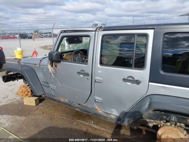 1C4BJWDG0EL320652 Jeep Wrangler Unlimited Sport