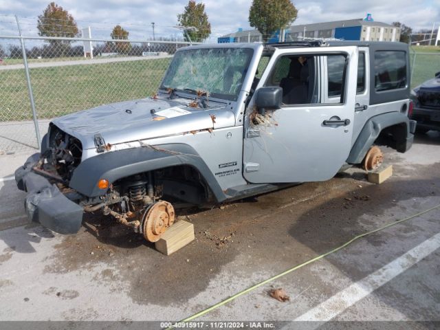 1C4BJWDG0EL320652 Jeep Wrangler Unlimited Sport