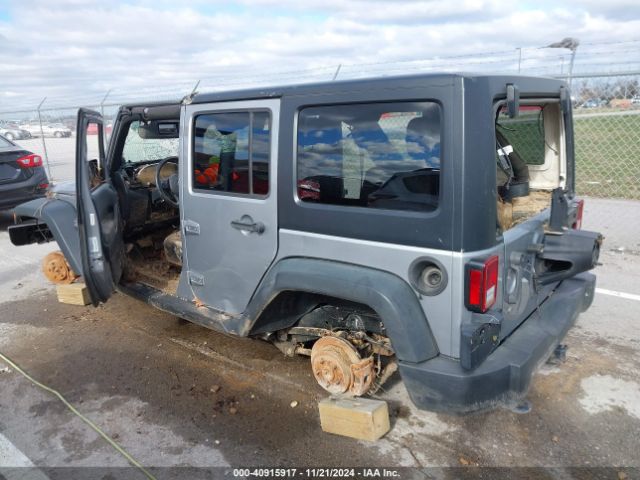 1C4BJWDG0EL320652 Jeep Wrangler Unlimited Sport
