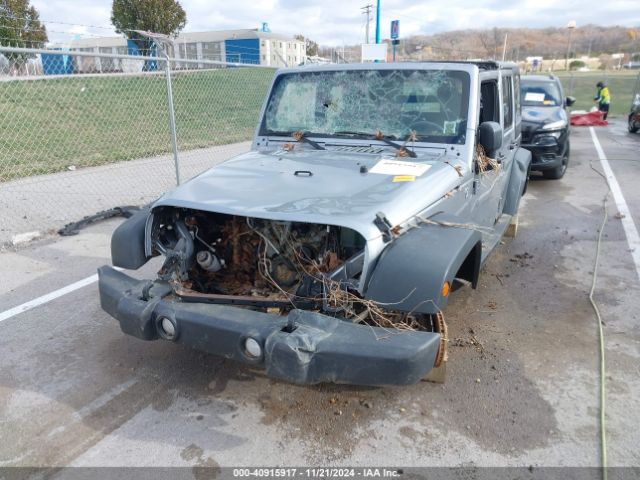 1C4BJWDG0EL320652 Jeep Wrangler Unlimited Sport