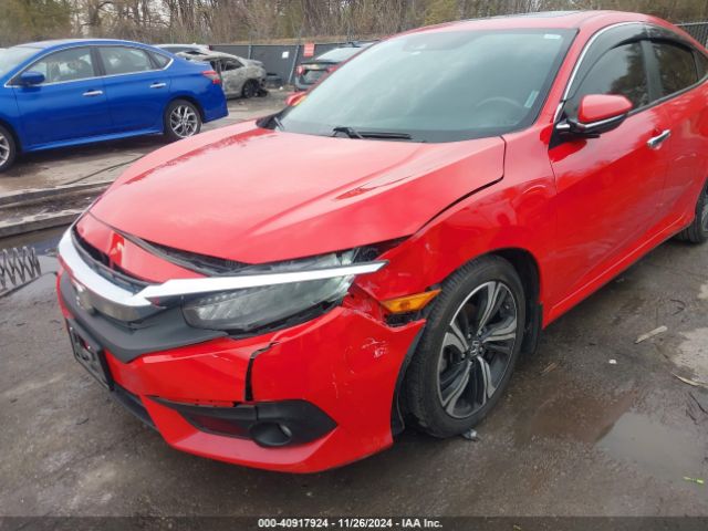 2HGFC1F9XGH633724 Honda Civic Touring