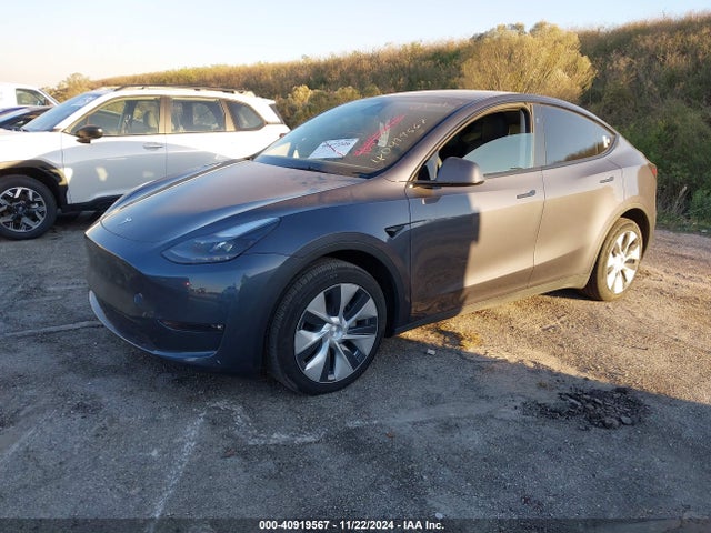 2023 TESLA MODEL Y 7SAYGDEE2PF807127 Photo 1