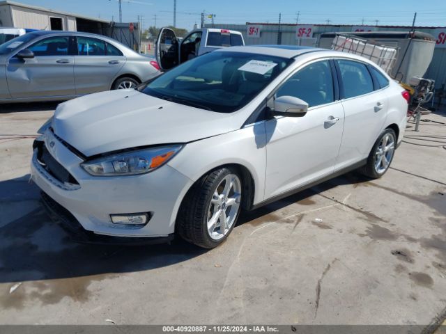 1FADP3J2XGL404596 Ford Focus Titanium