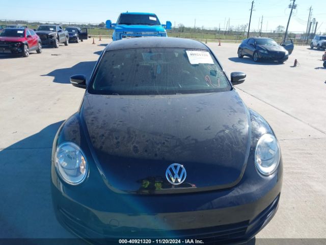 3VWJ17ATXEM636977 Volkswagen Beetle 1.8t