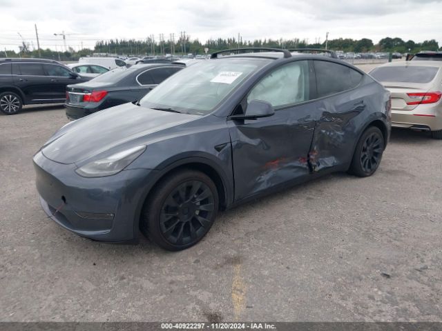 2023 TESLA MODEL Y 7SAYGDEE0PA194633 Photo 1