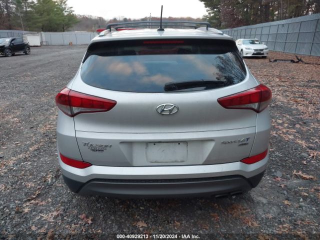 KM8J3CA26GU242528 Hyundai Tucson Sport