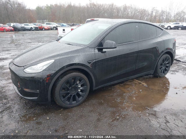 2023 TESLA MODEL Y 7SAYGAEE8PF610509 Photo 1