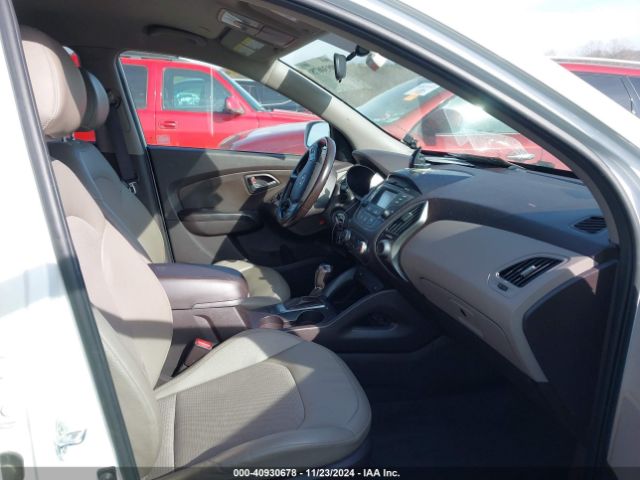 KM8JUCAG0EU948738 Hyundai TUCSON SE