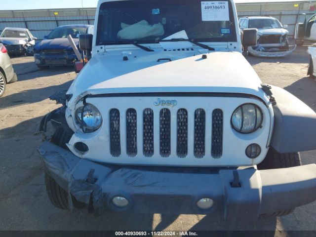 1C4BJWDG3EL295553 Jeep Wrangler Unlimited Sport