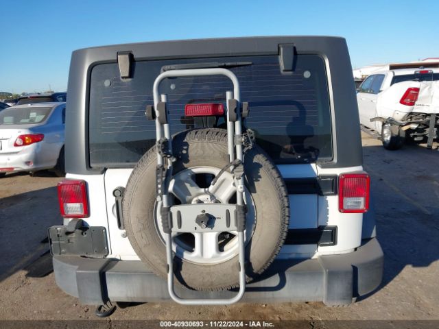1C4BJWDG3EL295553 Jeep Wrangler Unlimited Sport
