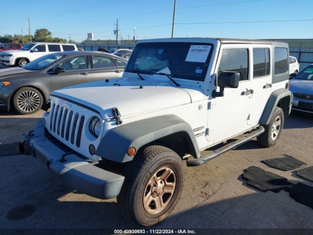 1C4BJWDG3EL295553 Jeep Wrangler Unlimited Sport