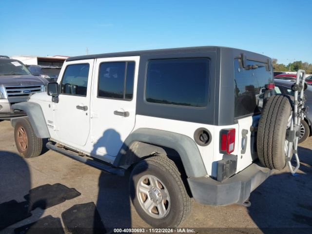 1C4BJWDG3EL295553 Jeep Wrangler Unlimited Sport