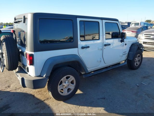 1C4BJWDG3EL295553 Jeep Wrangler Unlimited Sport