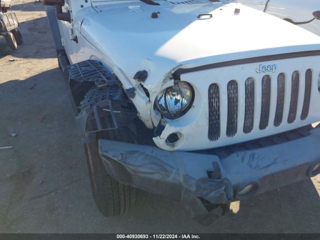 1C4BJWDG3EL295553 Jeep Wrangler Unlimited Sport