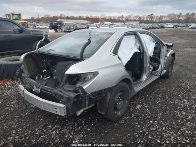 4T1BD1FK9GU184901 Toyota Camry Hybrid Le