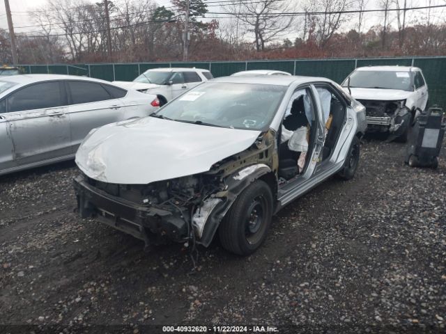 4T1BD1FK9GU184901 Toyota Camry Hybrid Le