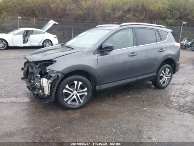 JTMZFREV0GJ099597 Toyota RAV4 LE