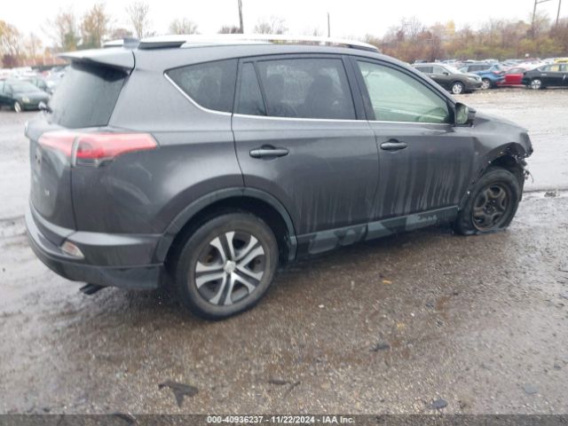 JTMZFREV0GJ099597 Toyota RAV4 LE