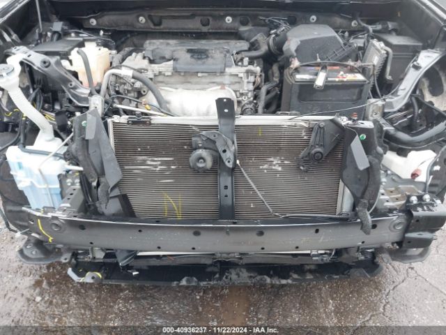JTMZFREV0GJ099597 Toyota RAV4 LE