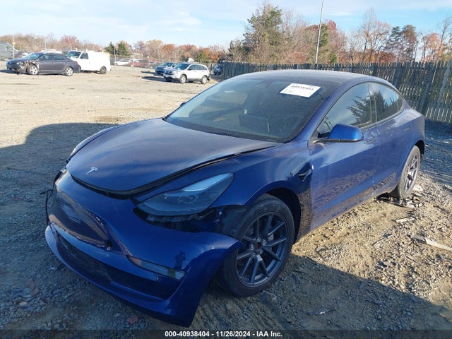 2023 TESLA MODEL 3 5YJ3E1EB8PF663049 Photo 1