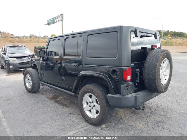 1C4BJWDGXGL248121 Jeep Wrangler Unlimited Sport