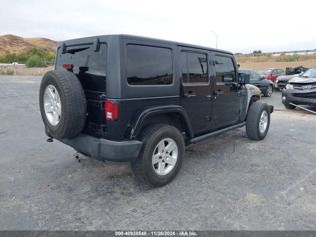 1C4BJWDGXGL248121 Jeep Wrangler Unlimited Sport