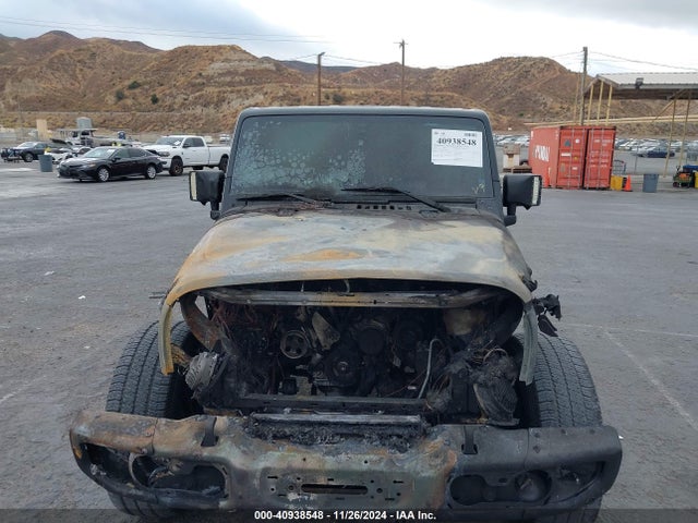 1C4BJWDGXGL248121 Jeep Wrangler Unlimited Sport
